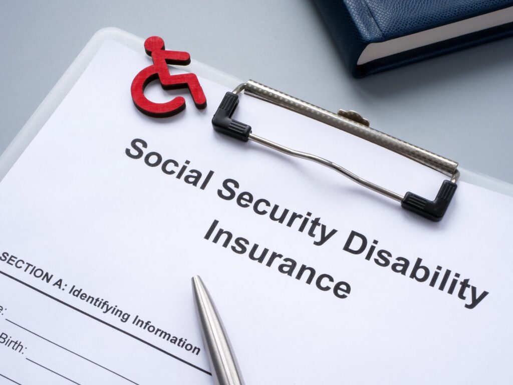 Clipboard of paperwork that says social security disability insurance